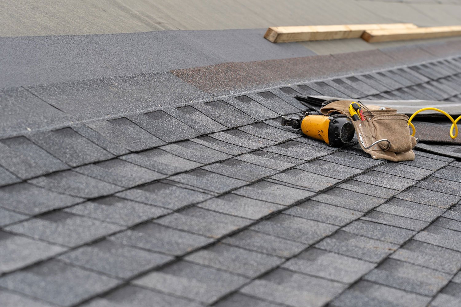 brand new roofing materials being installed on roof