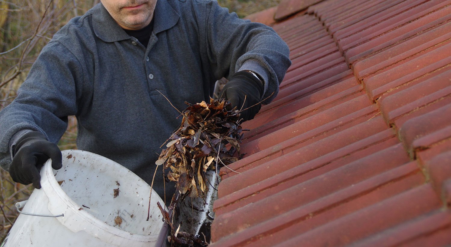 prevent water damage by cleaning gutters